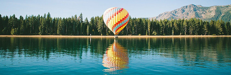 Spiegelung Ballon überm See